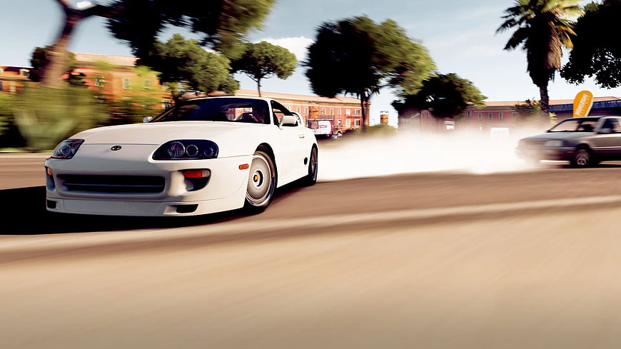 White Sports Car Drifting on Street
