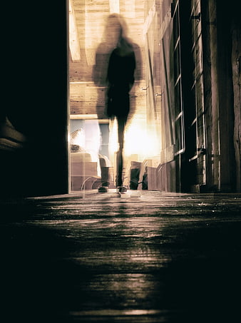 Spooky Ghostly Figure in Dark Wooden Hallway