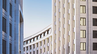 Modern White Office Building Facade With Curved Architecture