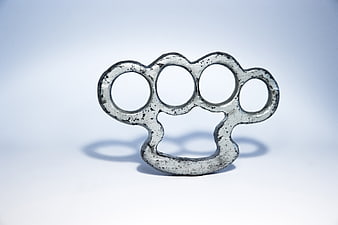 Vintage Metal Brass Knuckles on White Background