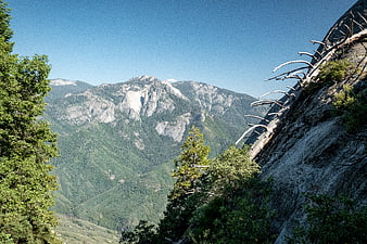 Scenic Mountain Valley View with Granite Peaks and Forest
