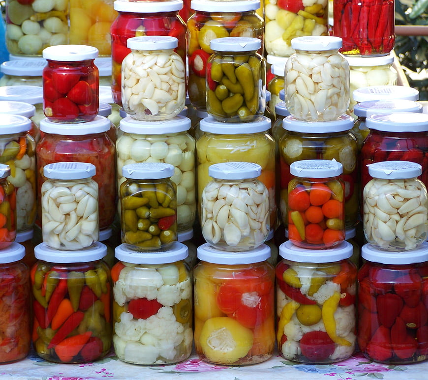 Colorful Jars of Pickled Vegetables and Preserves