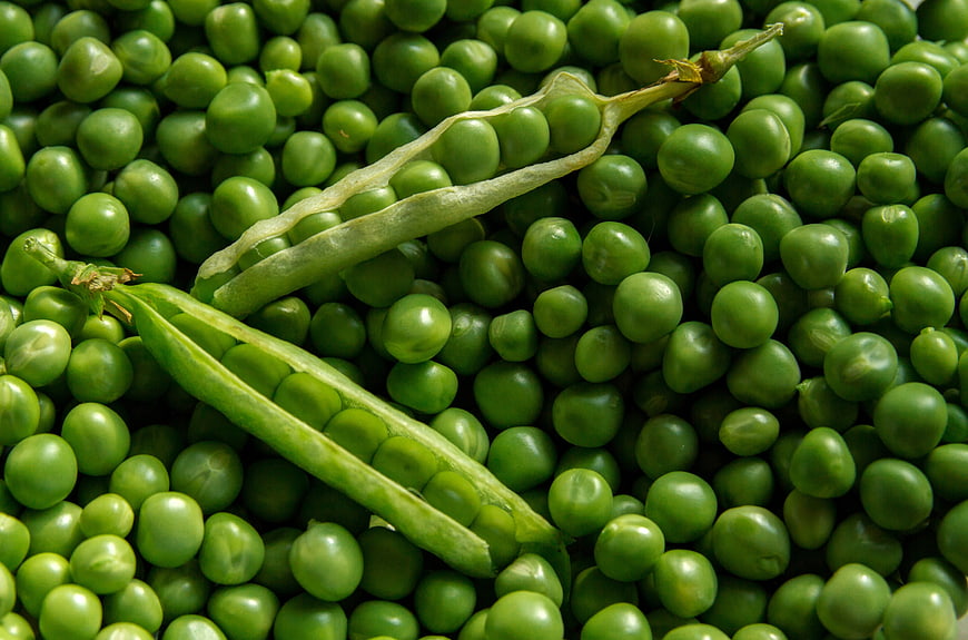 Fresh Green Peas and Pods Close-Up Texture