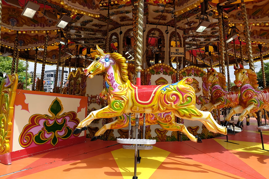 Colorful vintage carousel horse at a carnival fair