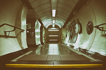 Empty London Underground Station Platform with Arched Ceiling