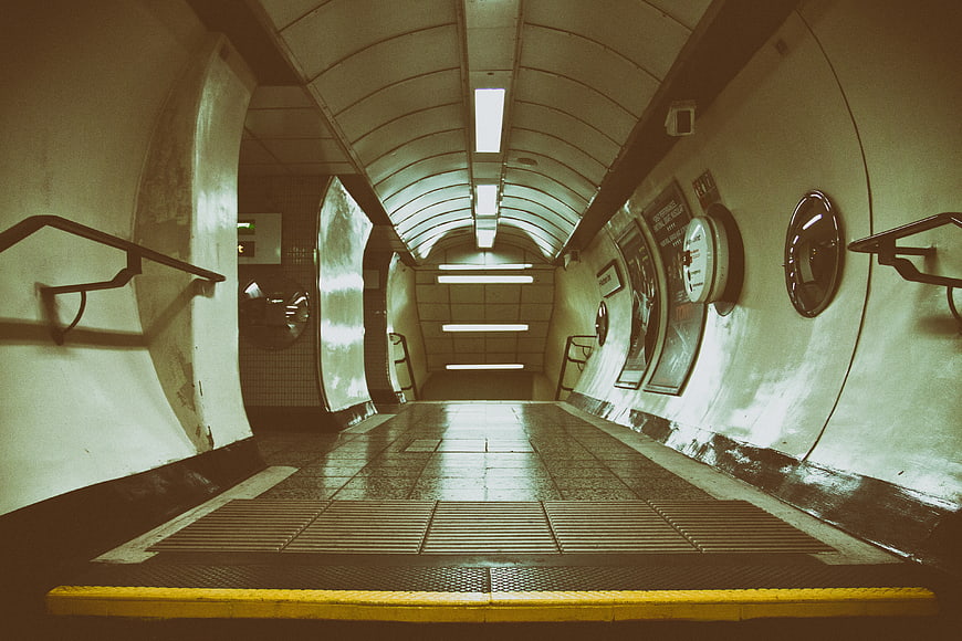 Empty London Underground Station Platform with Arched Ceiling