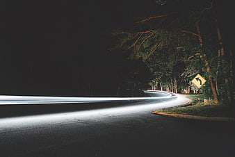 Long Exposure Light Trails on Curved Night Road