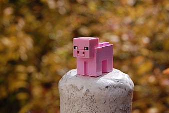 Pink Minecraft Pig Toy on Stone Post