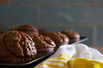 Freshly Baked Pumpkin Muffins with Seeds on Tray