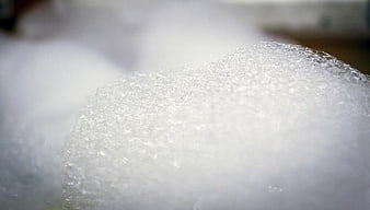 Close-up of white foam texture with bubbles