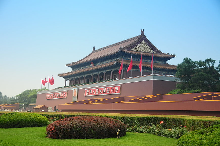 Tiananmen Gate Tower Beijing China with Red Flags and Blue Sky