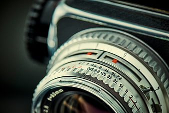 Close-up of vintage Hasselblad camera lens with metal texture