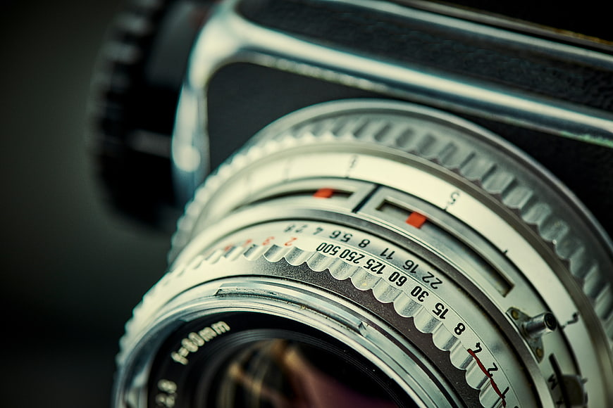 Close-up of vintage Hasselblad camera lens with metal texture