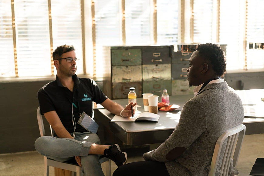Two Men Having a Job Interview in a Modern Office