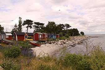 Colorful Swedish Beach Huts by the Sea