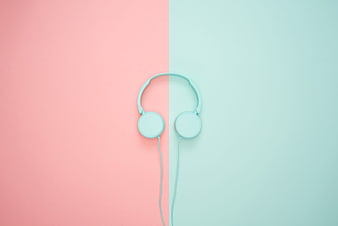 Mint Headphones on Split Pastel Pink and Mint Background