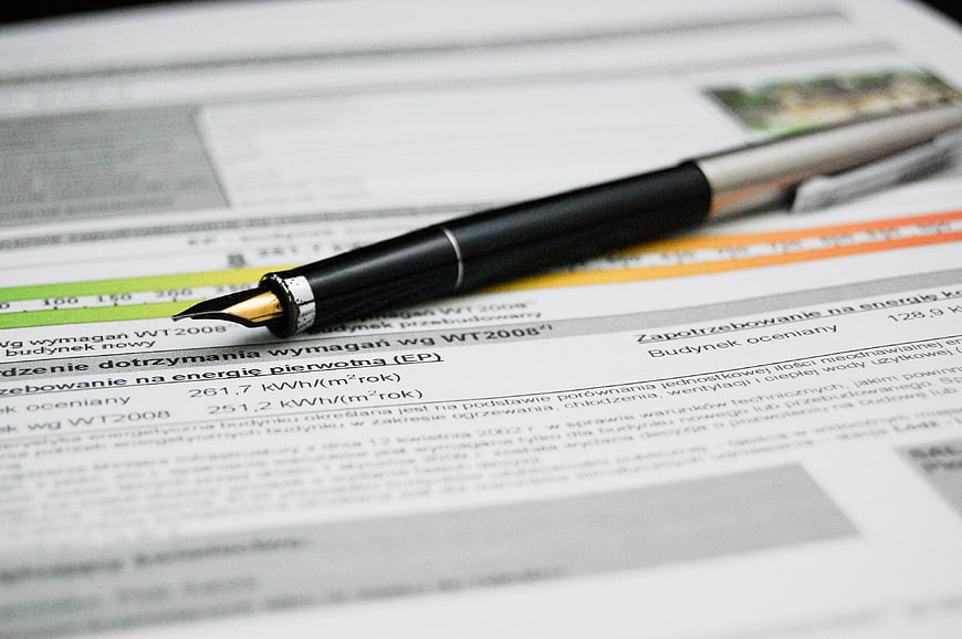 Fountain pen on energy efficiency certificate document