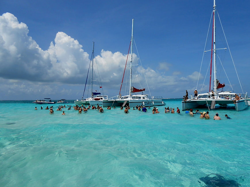 Catamarans and Swimmers in Turquoise Caribbean Waters