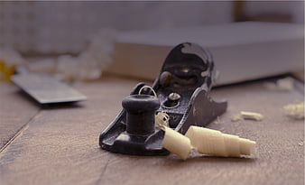 Vintage Woodworking Hand Plane with Wood Shavings