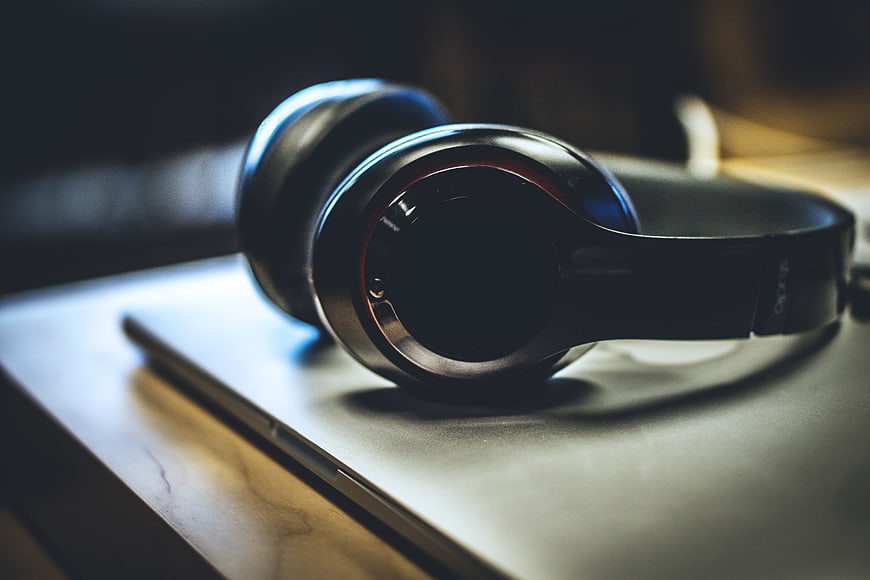 Black Headphones on Laptop
