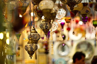 Colorful Turkish mosaic lamps hanging in a bazaar