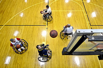 Wheelchair Basketball Players Practicing on Indoor Court