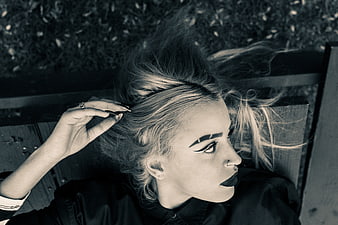 Gothic woman with dramatic makeup and windblown hair