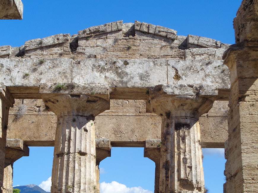 Ancient Greek Temple Ruins with Stone Columns and Blue Sky