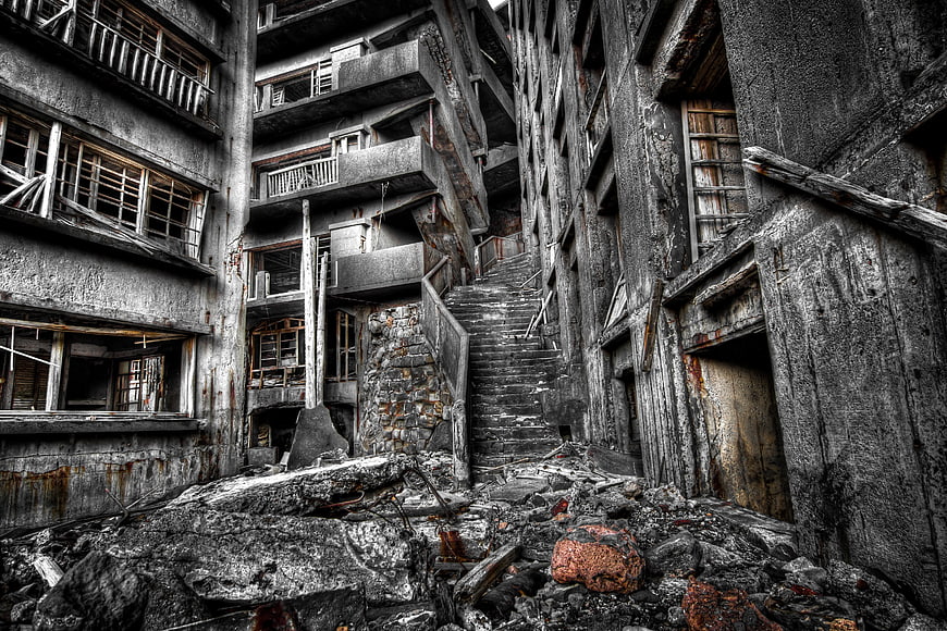 Abandoned concrete staircase in derelict industrial building