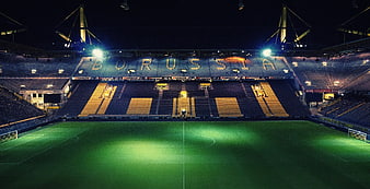 Signal Iduna Park stadium at night with Borussia Mönchengladbach seats