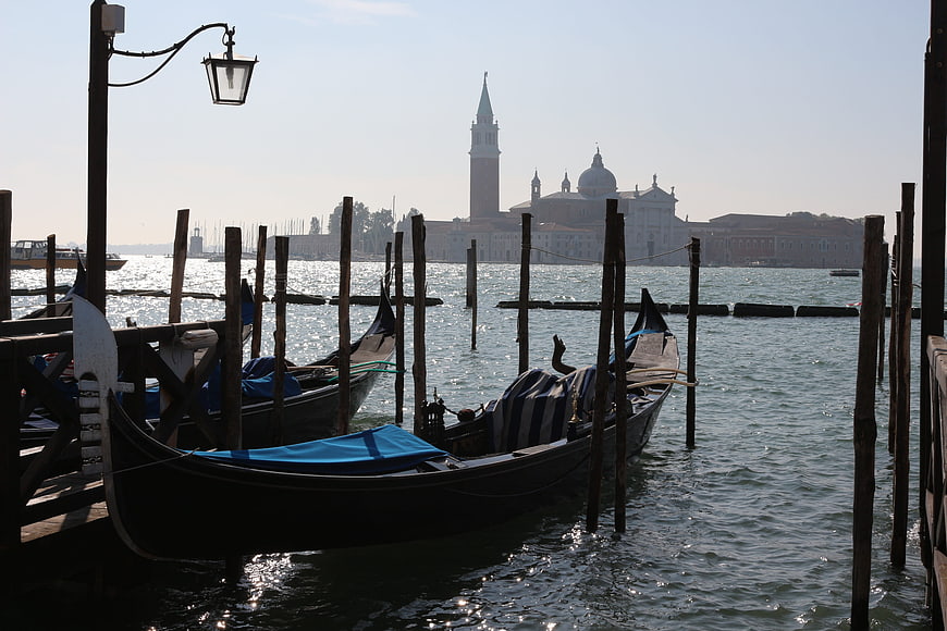 Gondolas moored in Venice lagoon with San Giorgio Maggiore in background