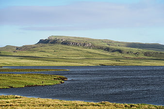 Scenic Highland Landscape with Lough and Rolling Green Hills