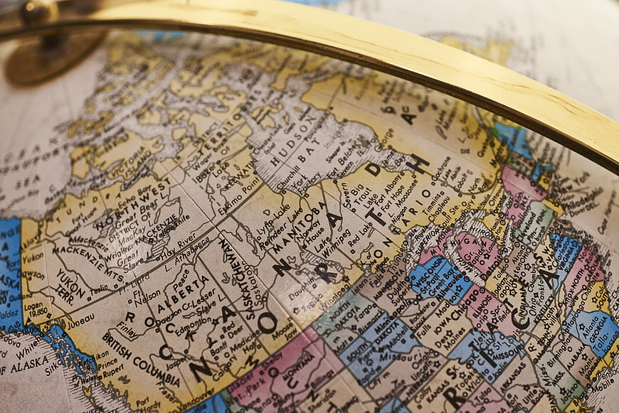 Close-up of vintage globe showing North America and Canada