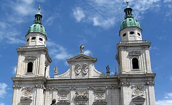 Baroque Cathedral Towers Against Blue Sky