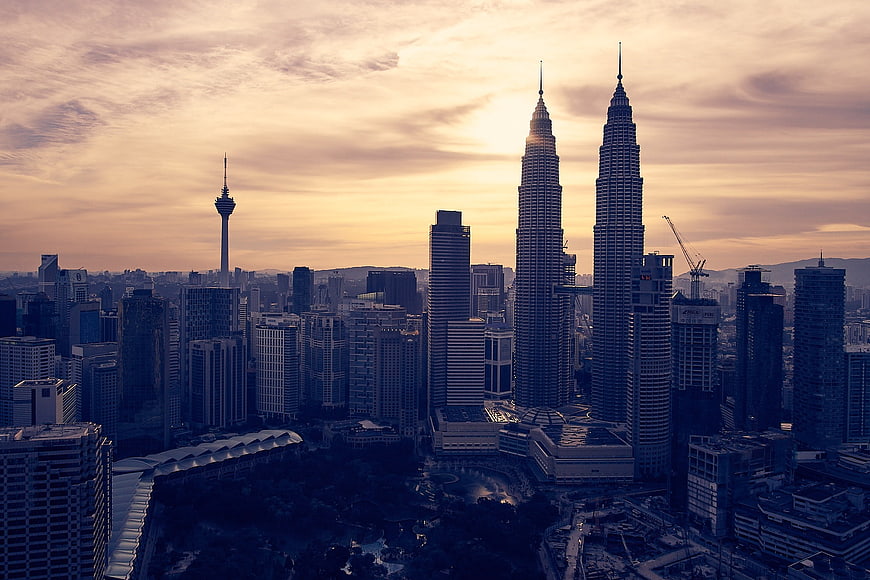 Kuala Lumpur Skyline Featuring Petronas Towers at Sunset