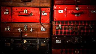 Stack of Vintage Leather Suitcases and Trunks