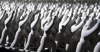 Rows of white clay figurines in a synchronized marching pose