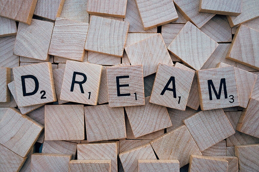 Wooden Scrabble Tiles Spelling Dream on Blank Tiles