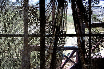 Black lace curtain pattern with floral design