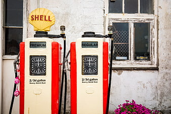 Vintage Shell Gas Pumps with Sold Out Signs