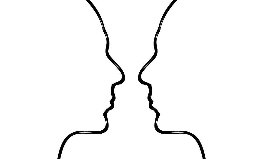 Black and white line art of two facing profiles