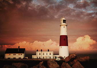 Portland Bill Lighthouse at Sunset with Dramatic Clouds