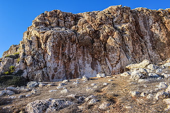 Rugged limestone cliff face in Cavo Greko National Park, Cyprus