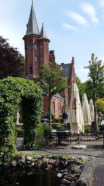 Brick Castle Tower with Garden Terrace in Bruges