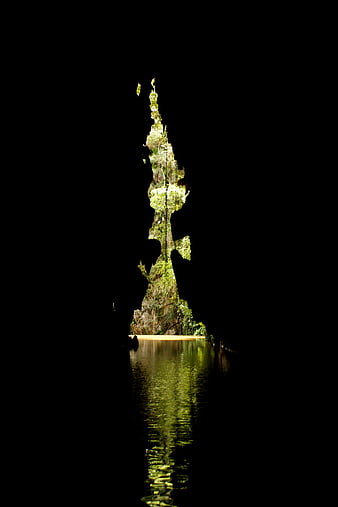 Mossy Rock Formation in Dark Water, Viñales Valley, Cuba
