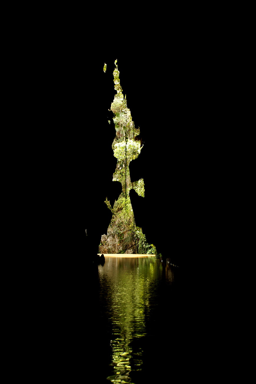 Mossy Rock Formation in Dark Water, Viñales Valley, Cuba