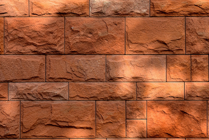 Textured Red Sandstone Brick Wall Background