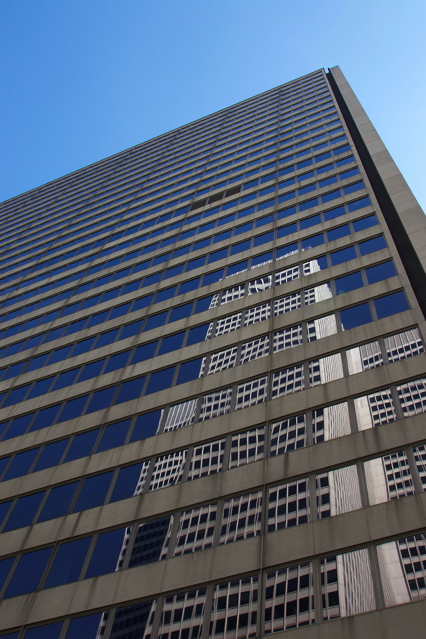 Low Angle View of Modern Glass Office Building