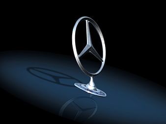 Mercedes-Benz Star Emblem On Dark Blue Car Hood