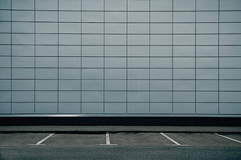 Minimalist gray tiled wall with parking lot lines